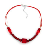 Kette, Würfel und Rillenolive rot