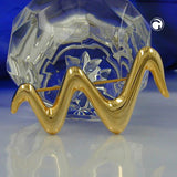 Brosche, Welle goldfarbig