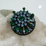 Brosche, emerald-hellsafir-schwarz