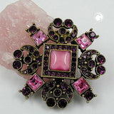 Brosche, lila-pink, altmessing
