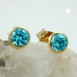 Stecker, 4mm Zirkonia türkis, 9Kt GOLD